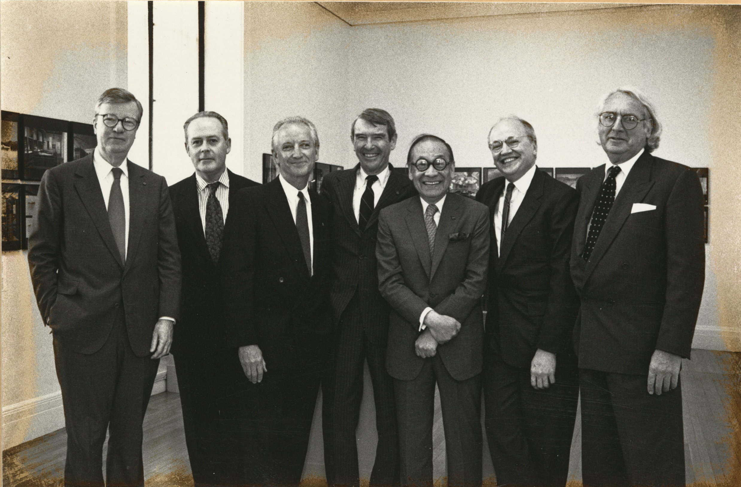 Henry Cobb, Rodolfo Machado, Michael Graves, Edward Larrabee Barnes, I.M. Pei, Jorge Silvetti, and Richard Meier standing together at the American Academy of Arts and Letters.
