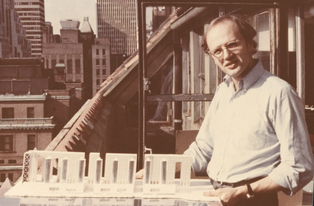 Jorge Silvetti standing outside with Roosevelt Island Housing Project Model.