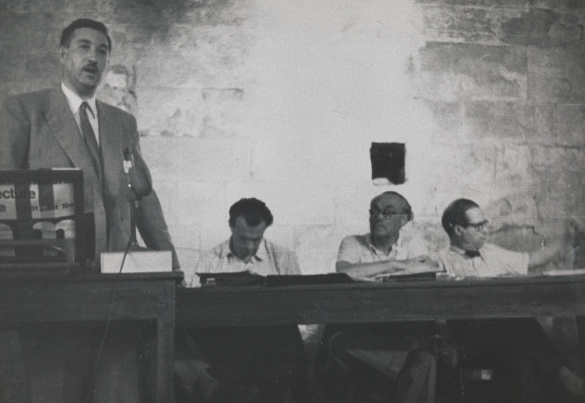 Photograph of interior (delegates listening to speaker) during the CIAM VII, at Bergamo.