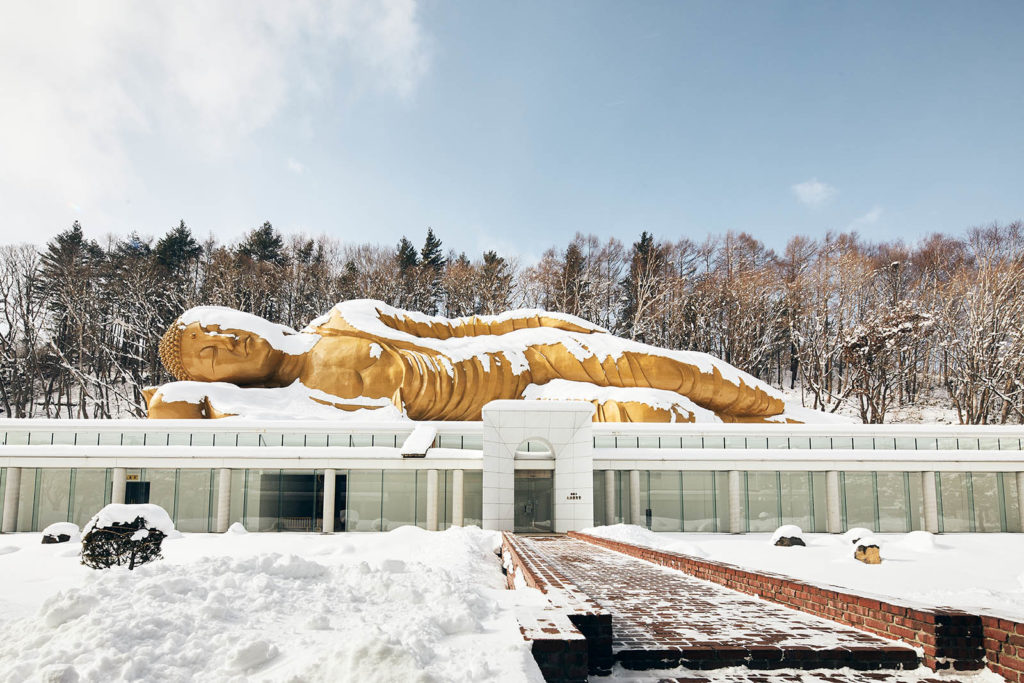 A snow covered statue